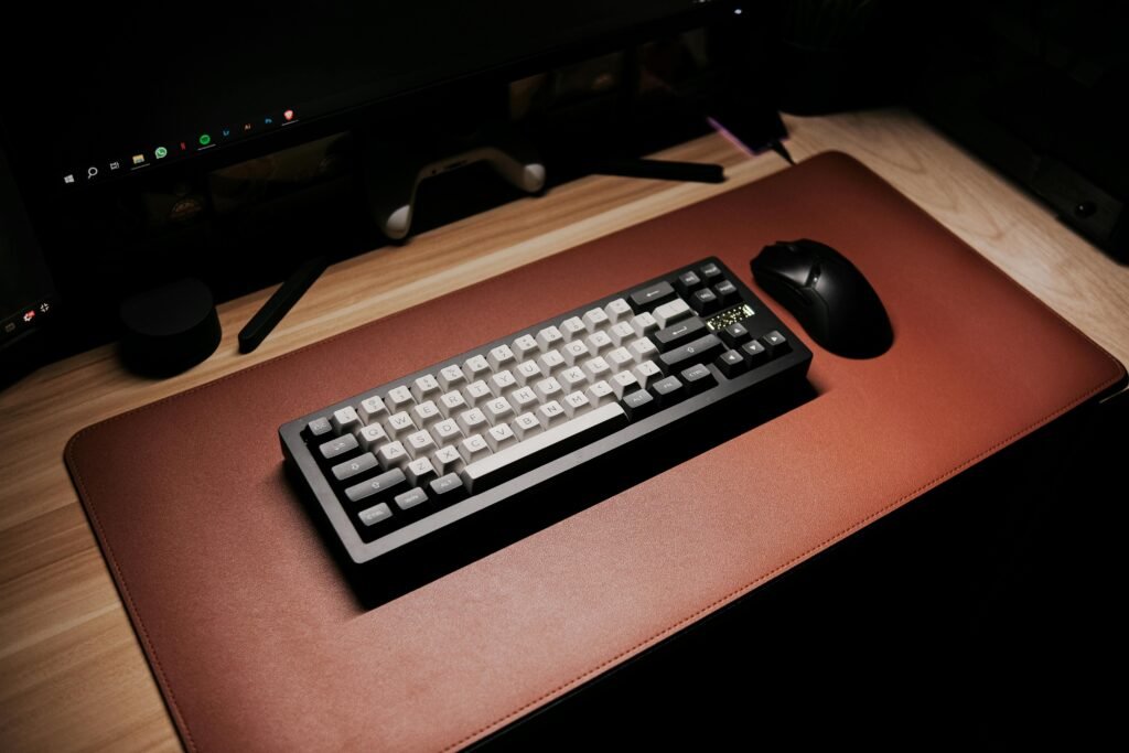 Quality keyboard and mouse  on a leather mat on the furniture